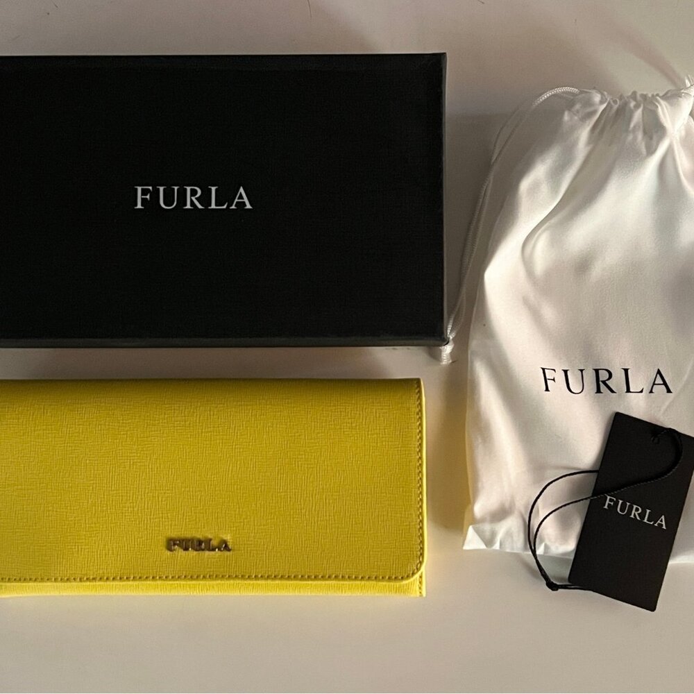 Brand new with tags Furla extra large bifold wallet in yellow leather